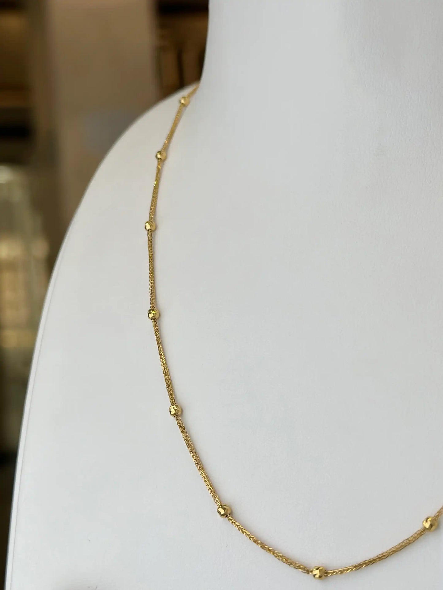 Gold beaded necklace