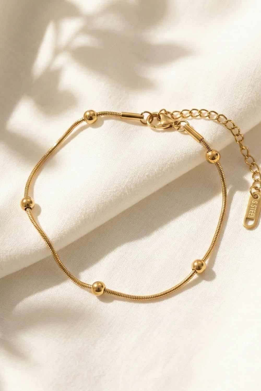 gold beaded bracelet