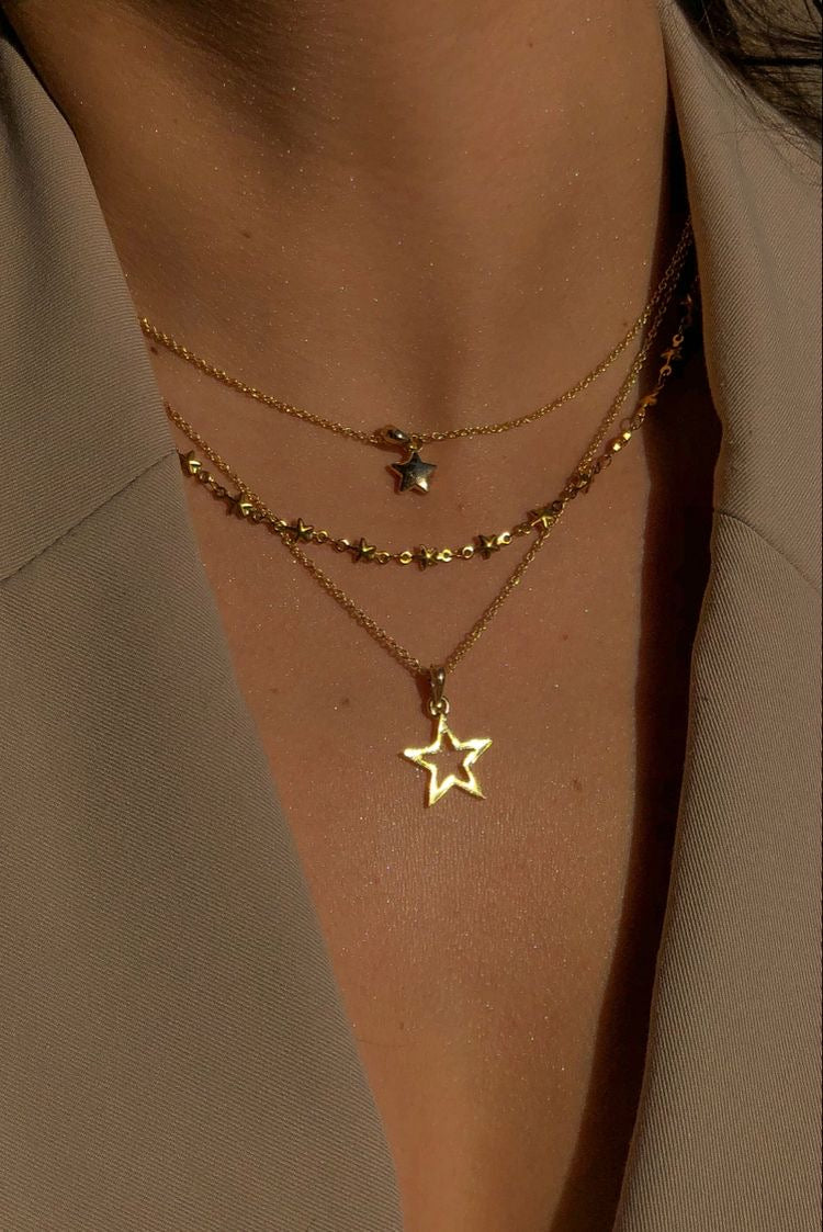HOW TO LAYER JEWELRY, ACCORDING TO BLINGS DESIGNERS
