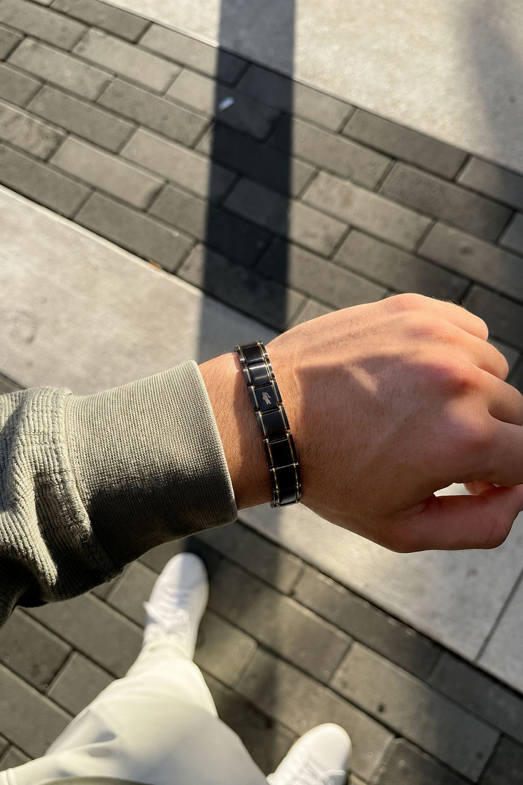 Black and Gold lacoste bracelet